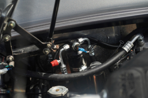 Even when working with limited engine bay space, our hardware kits can be modified and mounted for full access and functionality!